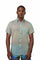man wearing a white holographic button up shirt from Love Khaos.