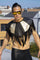 studded black and gold leather festival fringe top by Love Khaos