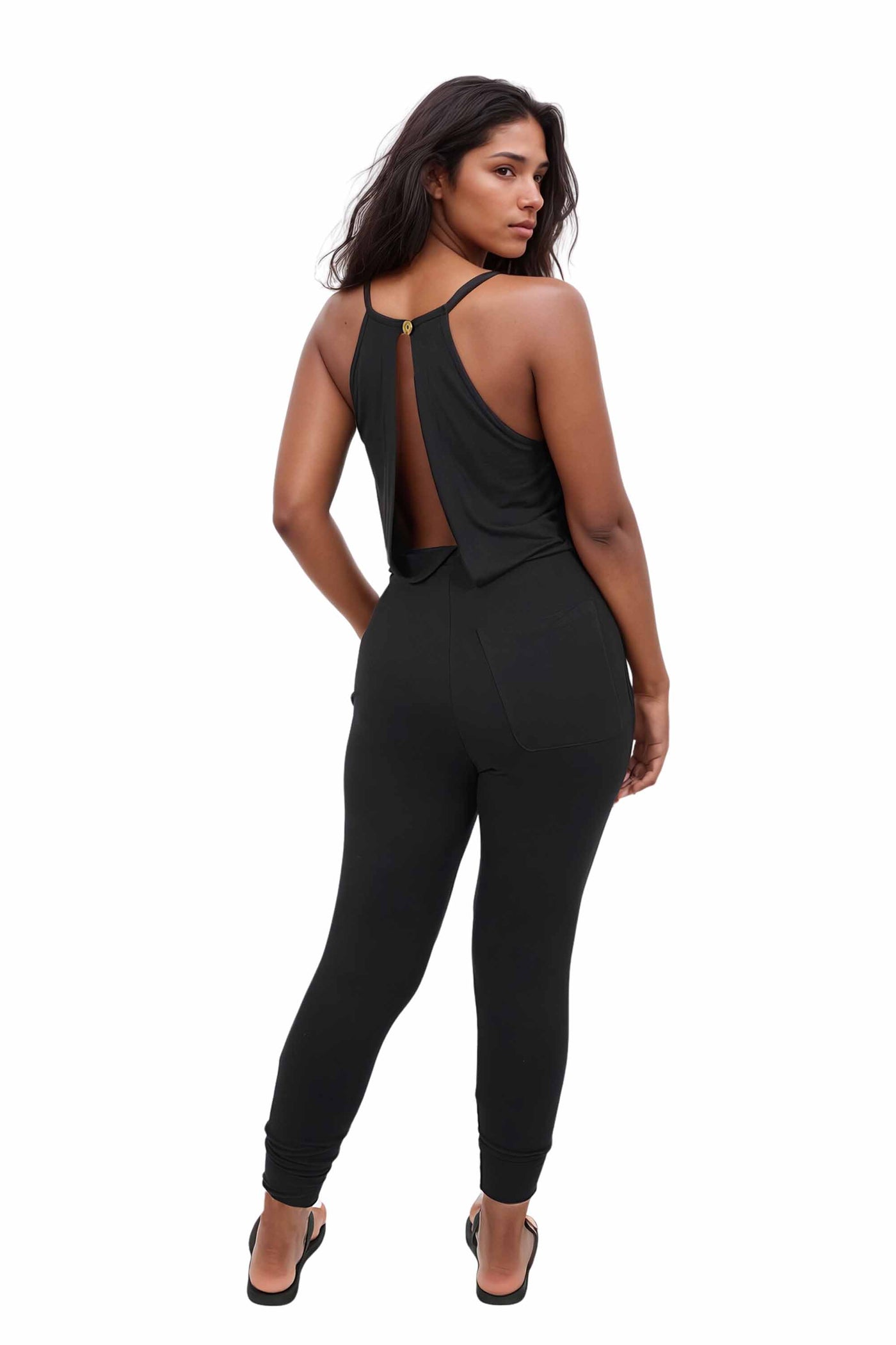 Woman wearing a Womens Black Casual Jumpsuit from Ekoluxe.