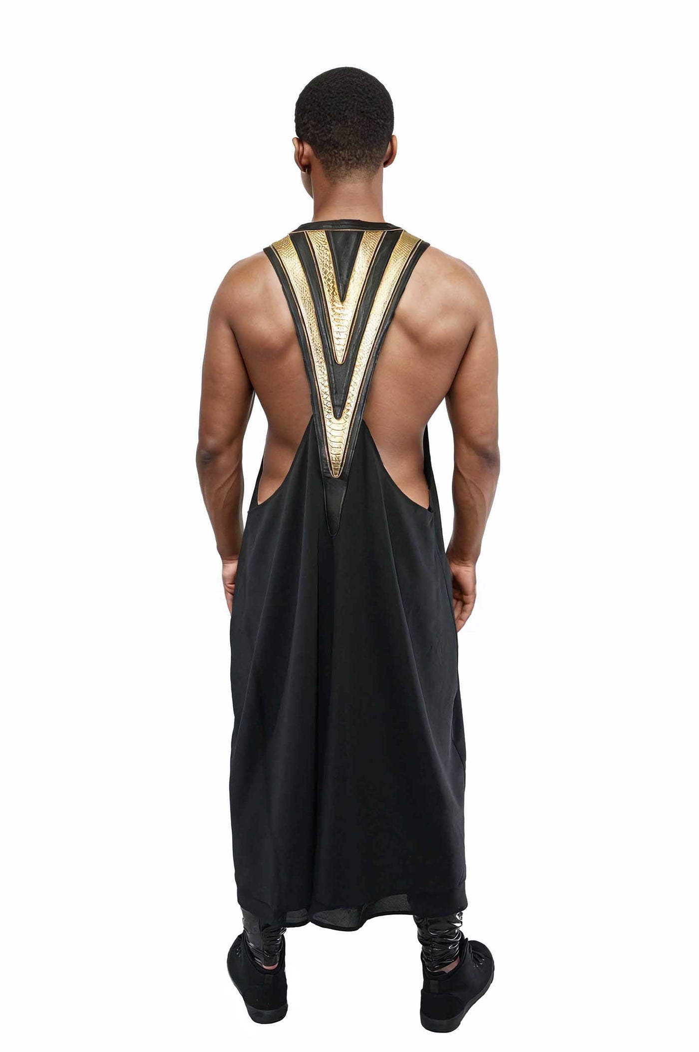 man wearing a black and gold kimono vest from Love Khaos