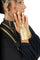 woman wearing gold gloves from Love Khaos