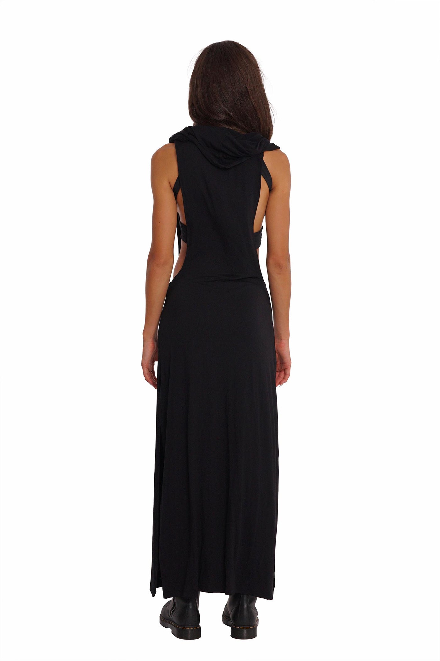 Woman wearing a black open side dress from Ekoluxe.