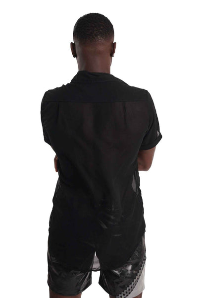 man wearing a black chiffon shirt from Love Khaos.