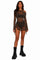 Woman wearing a mesh leopard print dress from Love Khaos.
