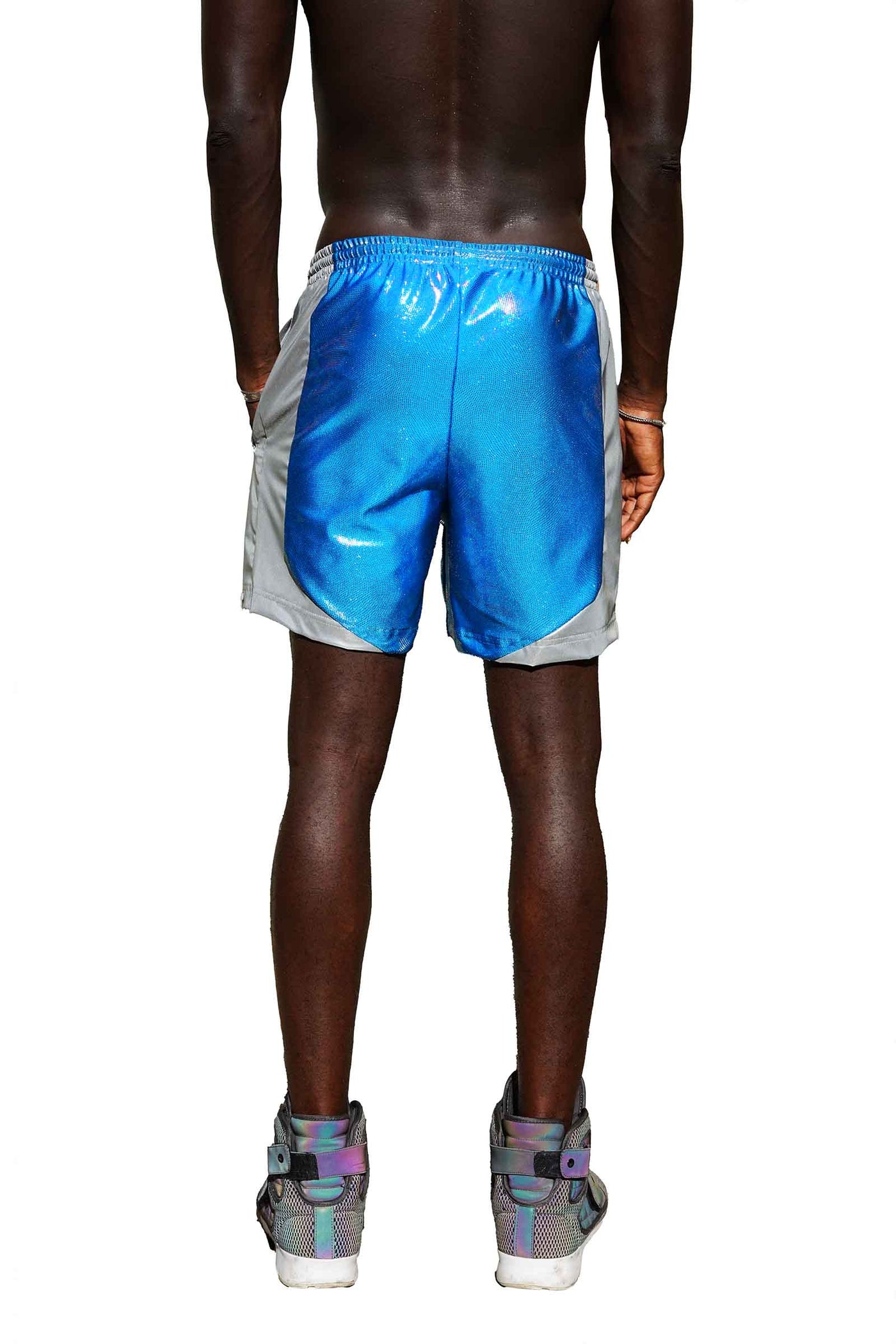 man wearing blue mens party shorts from Love Khaos