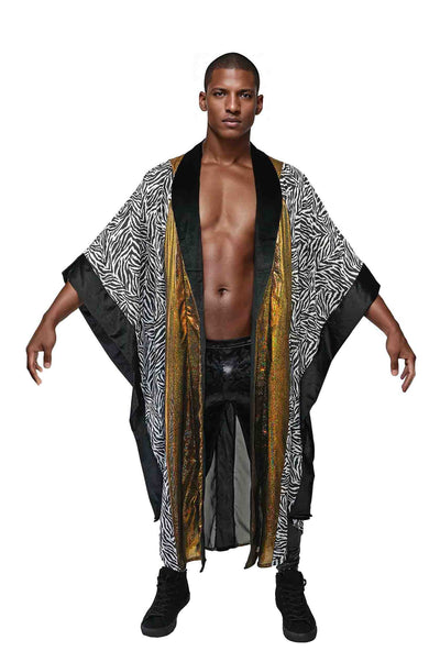 Man wearing a gold and black velvet kimono from Love Khaos.