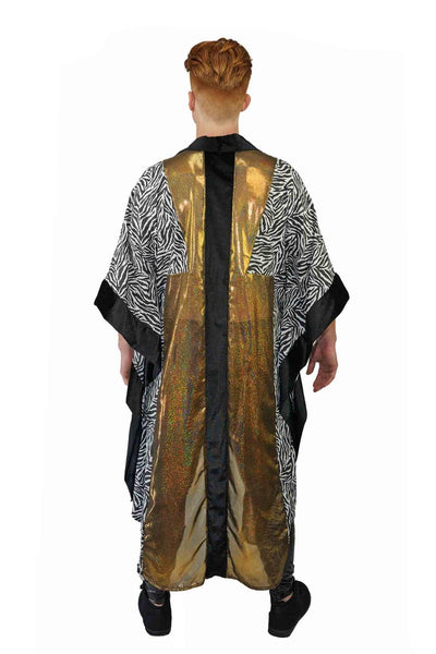 Man wearing a gold and black velvet kimono from Love Khaos.