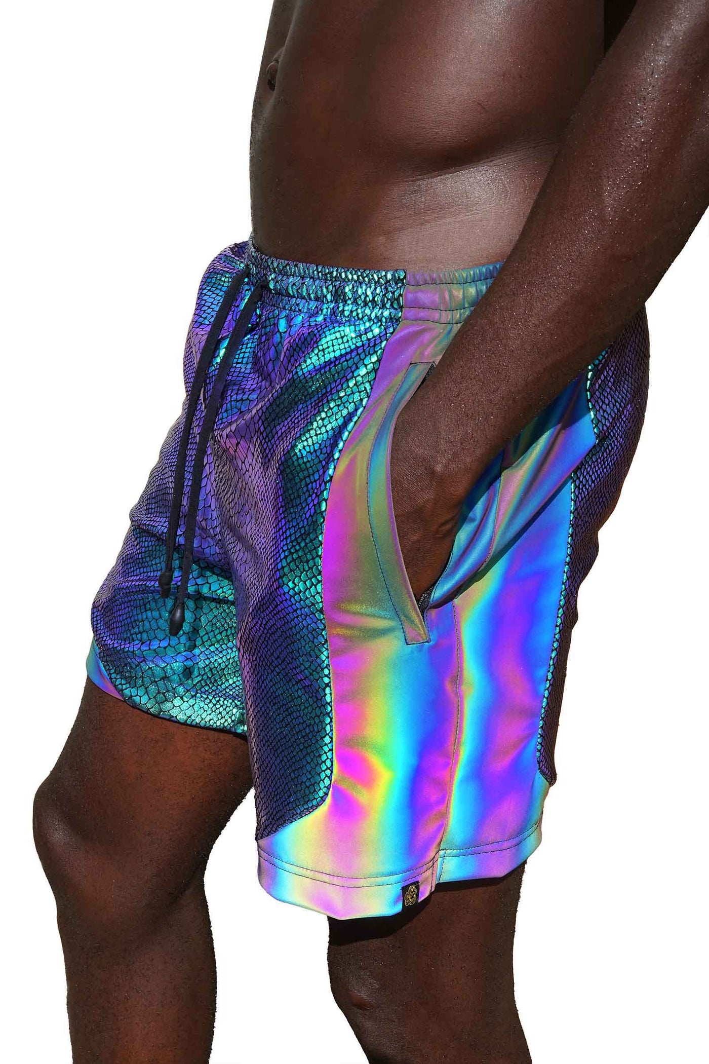 man wearing green rave shorts from Love Khaos