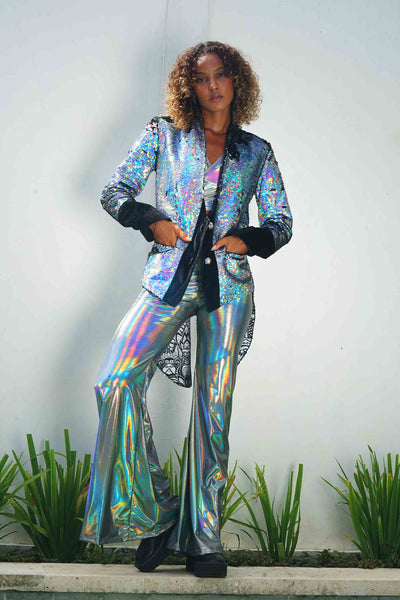 woman wearing a holographic silver sequin tailcoat from Love Khaos.