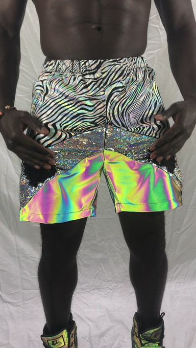 Holographic silver zebra print Mens Festival Shorts with reflective panels and pockets by Love Khaos