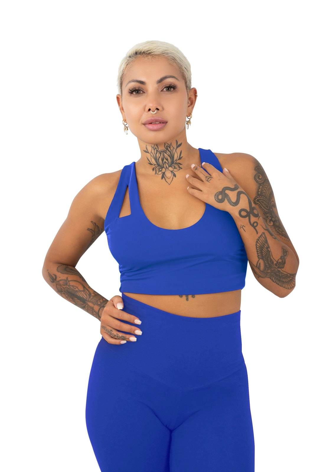 Cute blue crop top and matching blue high waisted leggings, a complete outfit set made from eco friendly recycled plastic fabric by Ekoluxe sustainable loungewear brand