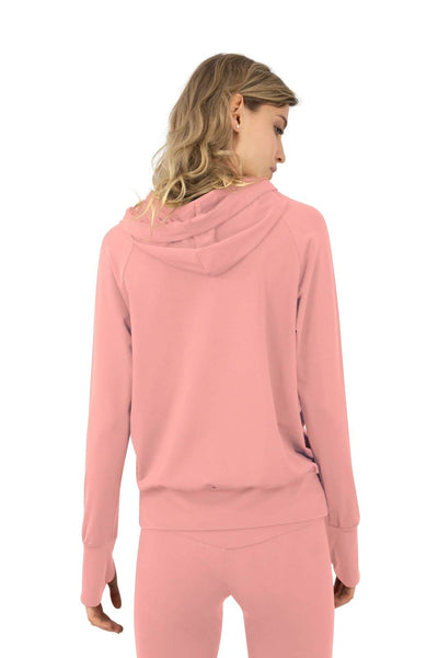 Lounge sweatshirt with matching leggings in peachy pink made from eco friendly recycled plastic fabric by Ekoluxe, a sustainable loungewear brand