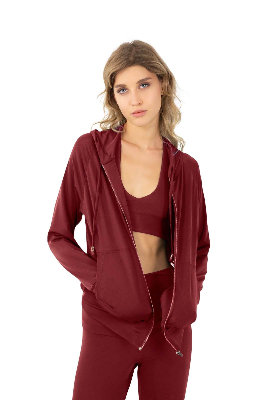 Thin zip up hoodie with matching leggings and bralette crop top in vino dark red made from eco friendly recycled plastic fabric by Ekoluxe, a sustainable loungewear brand