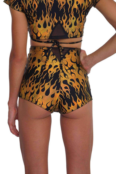 Holographic gold flame print lace up shorts from Love Khaos.