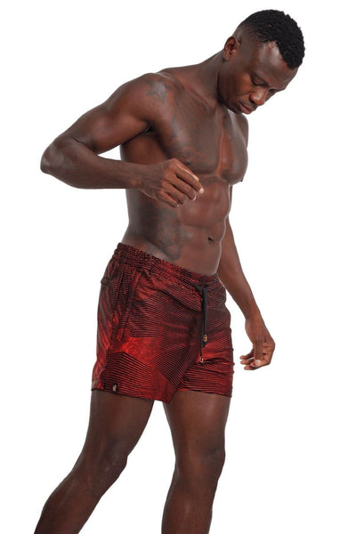 Mens lined shorts in red geometric print for festival wear from Love Khaos