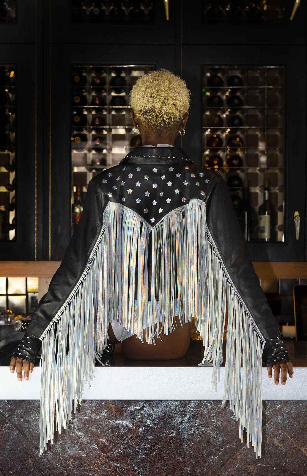 Holographic Silver leather fringe jacket from Love Khaos Festival Clothing brand.