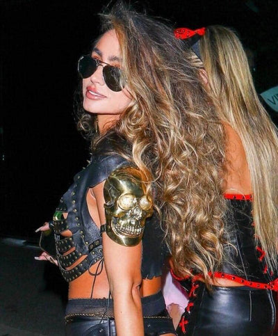 Sommer Ray wearing Black leather skeleton harness with gold skull shoulder pads from Love Khaos