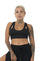 Woman wearing a black sustainable crop top bralette from EKOLUXE ethical fashion brand.